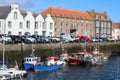 Fishing boats, quay, buildings Eyemouth, Scotland