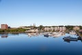 Fishing Boats and Reflections in Calm Blue Bay Royalty Free Stock Photo