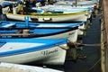 Fishing boats in row order at the Port of Bardolino Italy Royalty Free Stock Photo