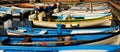 Wide angle of Fishing boats in row order at the Port of Bardolino Italy Royalty Free Stock Photo