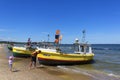 Fishing boats by the sandy beach on the Baltic Sea on a sunny day, Sopot, Poland Royalty Free Stock Photo