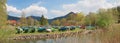 Fishing boats beside Schlierach river, tourist resort Schliersee landscape