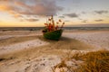 Fishing boats on the sea beach during sunset Royalty Free Stock Photo