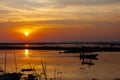 Fishing boats in the shadows sunset background Royalty Free Stock Photo