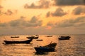 Fishing boats, small boats floating in the sea at sunrise, Concept sea in the morning.