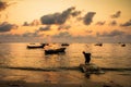 Fishing boats, small boats floating in the sea at sunrise, Concept sea in the morning.