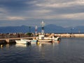 Fishing Boats in Small harbour, Dramatic Morning Light, Greece Royalty Free Stock Photo