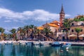 Fishing boats in Splitska village with beautiful port, Brac island, Croatia. Village of Splitska on Brac island seafront view,