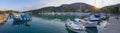 Fishing boats stand in the marina of the resort town of Methana in the Peloponnese in Greece Royalty Free Stock Photo