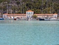 Fishing boats stand in the marina of the resort town of Methana in the Peloponnese in Greece Royalty Free Stock Photo