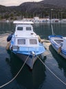 Fishing boats stand in the marina of the resort town of Methana in the Peloponnese in Greece Royalty Free Stock Photo