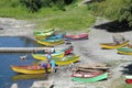 Fishing boats standing on river shore