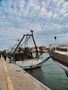 Fishing boats stands moored in the marina