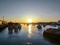 Fishing boats at sunset in Isla Cristina harbour, Huelva, province of Andalusia, Spain. Royalty Free Stock Photo