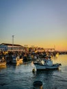 Fishing boats at sunset in Isla Cristina harbour, Huelva, province of Andalusia, Spain Royalty Free Stock Photo