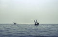 fishing boats during sunset sky at beach landscape, fishing boats during a sunrise or sunset Royalty Free Stock Photo