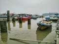 Fishing boats in Teluk Bayu Floating Chalets Area Royalty Free Stock Photo