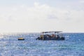 Fishing boats at Tropical mexican beach Playa del Carmen Mexico