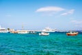 Fishing boats and voyage yacht near berth on the greece sea bay Royalty Free Stock Photo