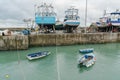 Fishing boats on the wharf in the Granville port ready fÃÂ¼r refurbishment Royalty Free Stock Photo