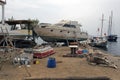 Fishing boats, wooden boats and ships on the lift in a shipyard in Bodrum, Turkey