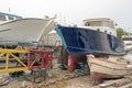 Fishing boats, wooden boats and ships on the lift in a shipyard in Bodrum, Turkey