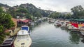 Fishing boats and yachts laying in a dock Royalty Free Stock Photo