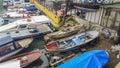 Fishing boats and yachts laying in a dock Royalty Free Stock Photo