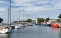 Fishing boats and yachts moored in the port of Mrzezyno, Western Pomerania, Poland, Europe. Fishery and yachting in the Baltic Sea