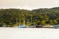 Fishing boats and yachts at the pier of the tropical Koh Chang island, Thailand. Royalty Free Stock Photo