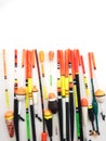 Fishing bobbers  on a white background. Composition of plastic fishing floats. Royalty Free Stock Photo