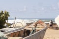 Fishing canoes moored in the sand on the beach