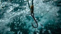 Fishing. Close-up shut of a fish hook under water Royalty Free Stock Photo