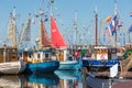 Fishing day decoratedl fishing ships in the harbor