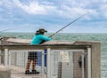 fishing on the dock, pier Atlantic Ocean Royalty Free Stock Photo