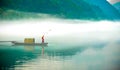 Fishing on Dongjiang Lake at dawn