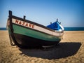 Fishing Dory on the beach in Nazare, Portugal