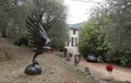 Fishing eagle statue in the garden of sculptor Jean-Pierre Augier