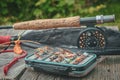 Fishing equipment. Rod, box with flies and landing nets Royalty Free Stock Photo