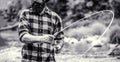 Fishing. Fisherman with Fishing Rod on the Lake Shore. Fishing rod lake fisherman men sport summer. Fisherman with rod Royalty Free Stock Photo