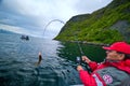 Fishing in fjord Royalty Free Stock Photo