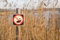 Fishing forbidden sign by a lake