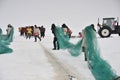 Fishing on a frozen lake