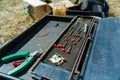 The fishing gear on green grass under the sun Royalty Free Stock Photo