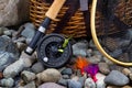 Fishing Gear on River Bed Rocks Royalty Free Stock Photo