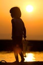 Fishing Girl in the Sunset Royalty Free Stock Photo