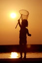 Fishing Girl in the Sunset Royalty Free Stock Photo