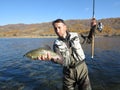 Fishing - grayling fishing in Mongolia Royalty Free Stock Photo