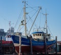 Fishing harbor in North Sea Schleswig-Holstein with various fish cutters Royalty Free Stock Photo