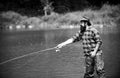 Fishing hobby and summer weekend. Bearded men fisher with fishing rod.